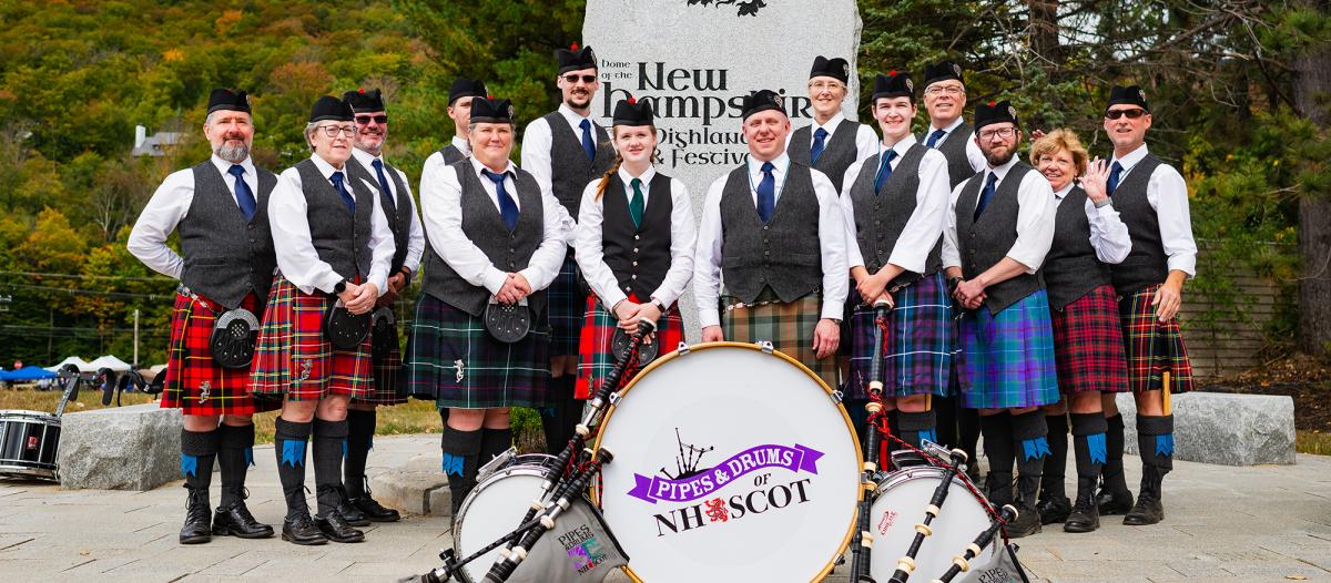 An image of the Pipes and Drums of NHSCOT band. 